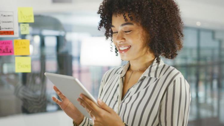 woman working on tablet in office