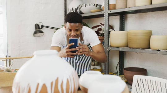 man taking pictures for social media